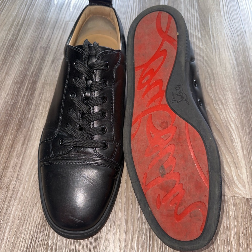 Christian Louboutin Black and Red Sneakers with Iconic Red Sole